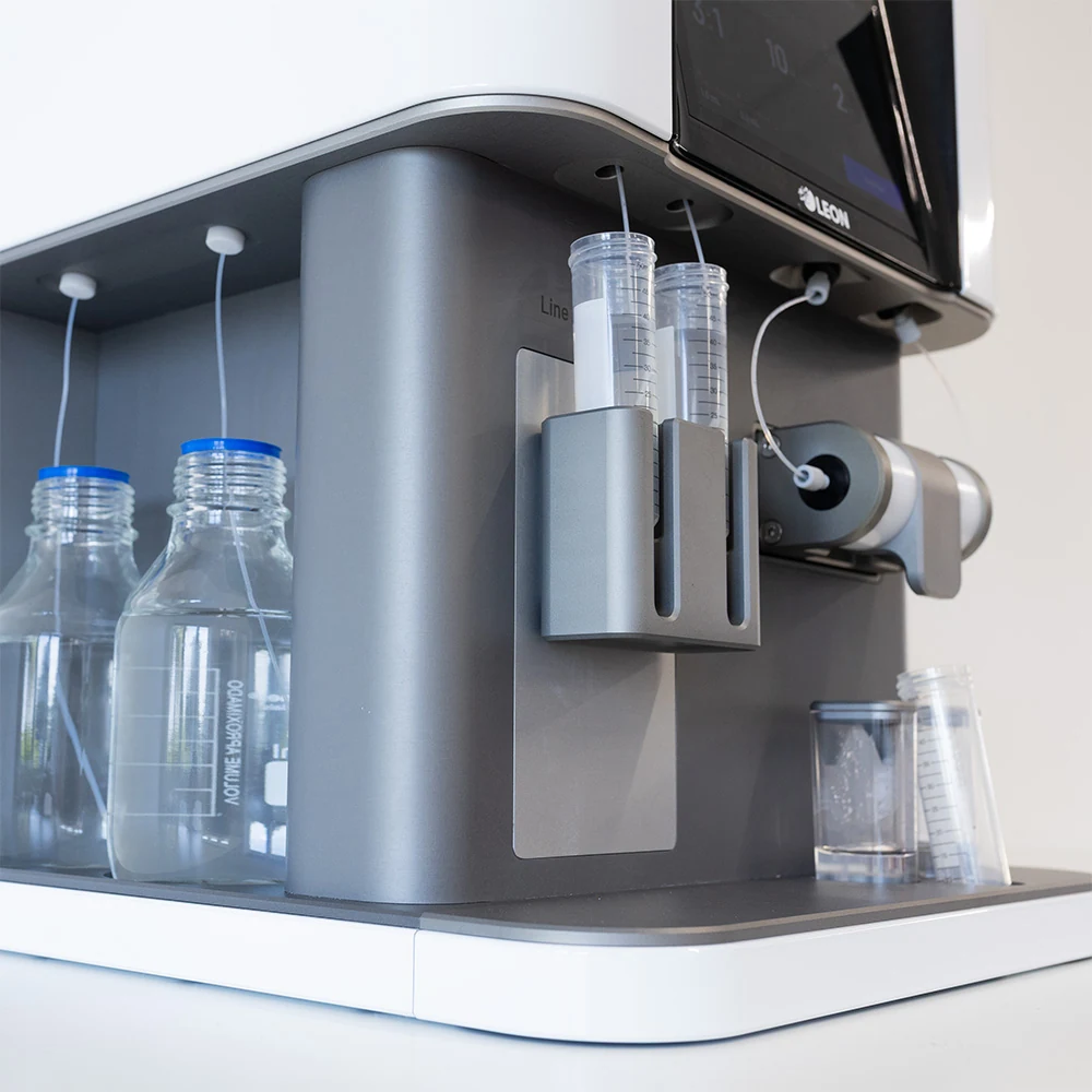 Side view of the NANOscreen® with reservoir bottles, sample tube holder and mixer