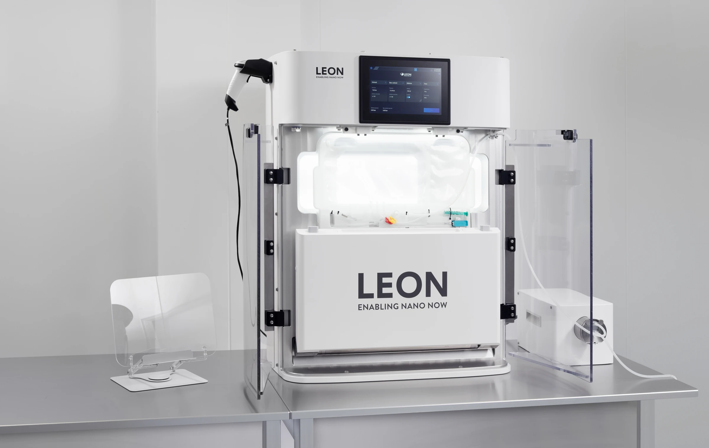 NANOme® system with doors open showing disposable cassette and internal components
